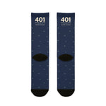 Back flat lay of navy 401 State of Mind Rhode Island crew socks showing black heels and toes