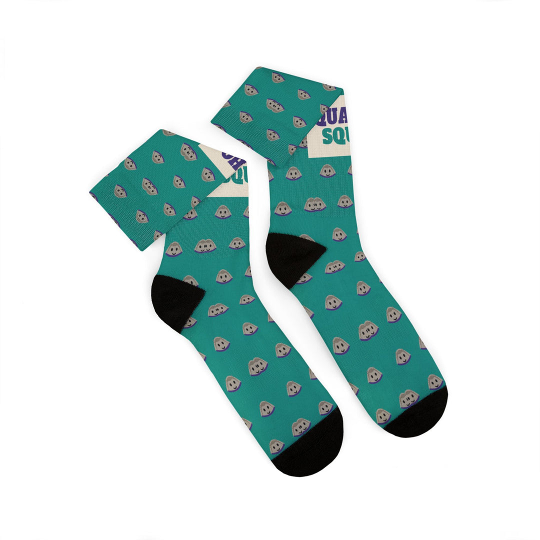 Folded pair of Quahog Squad Rhode Island socks stacked at an angle, black heels and teal clam shell pattern