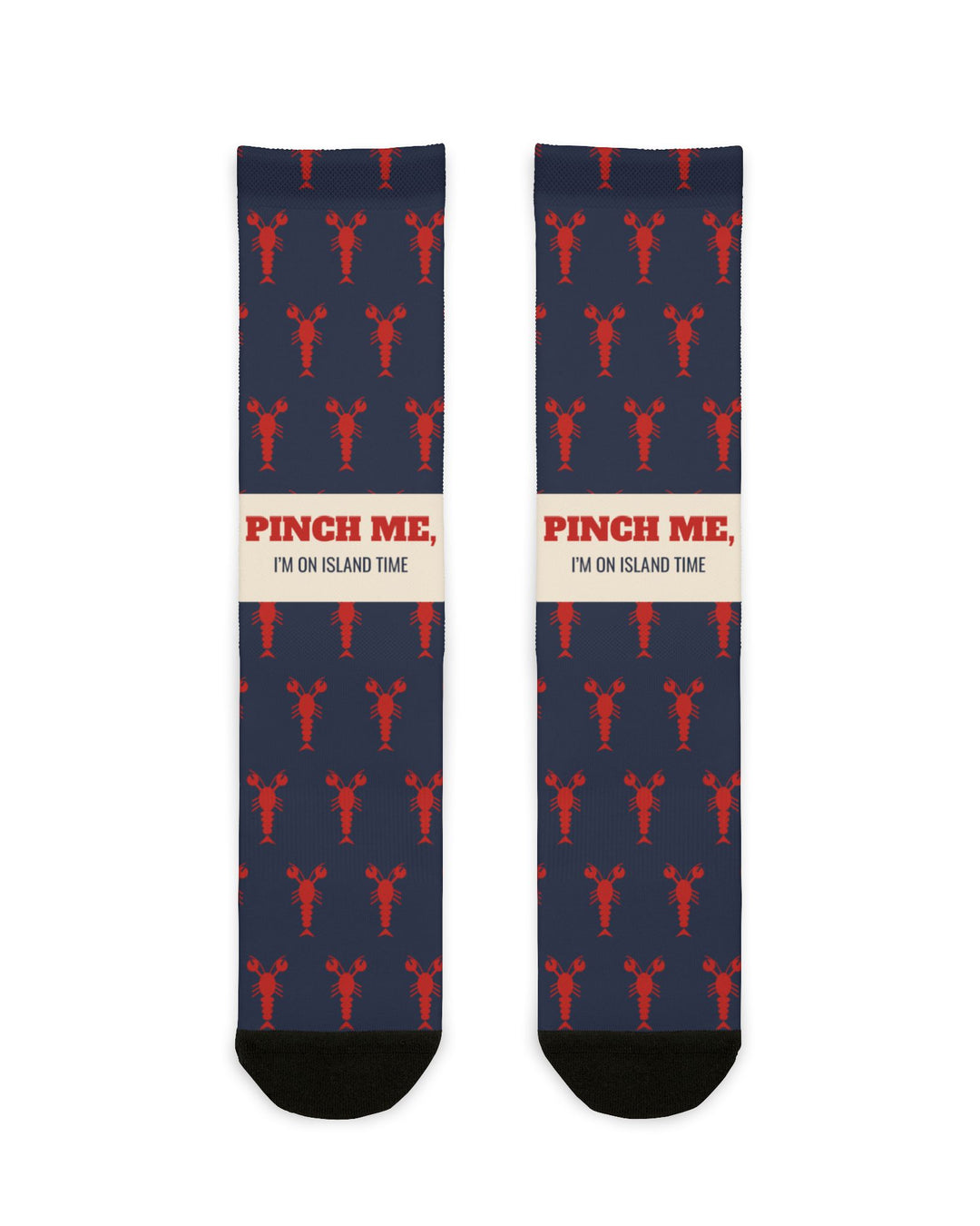 BlockBoundRI Pinch Me, I'm on Island Time lobster socks, navy with red lobsters and cream slogan band, front flat lay