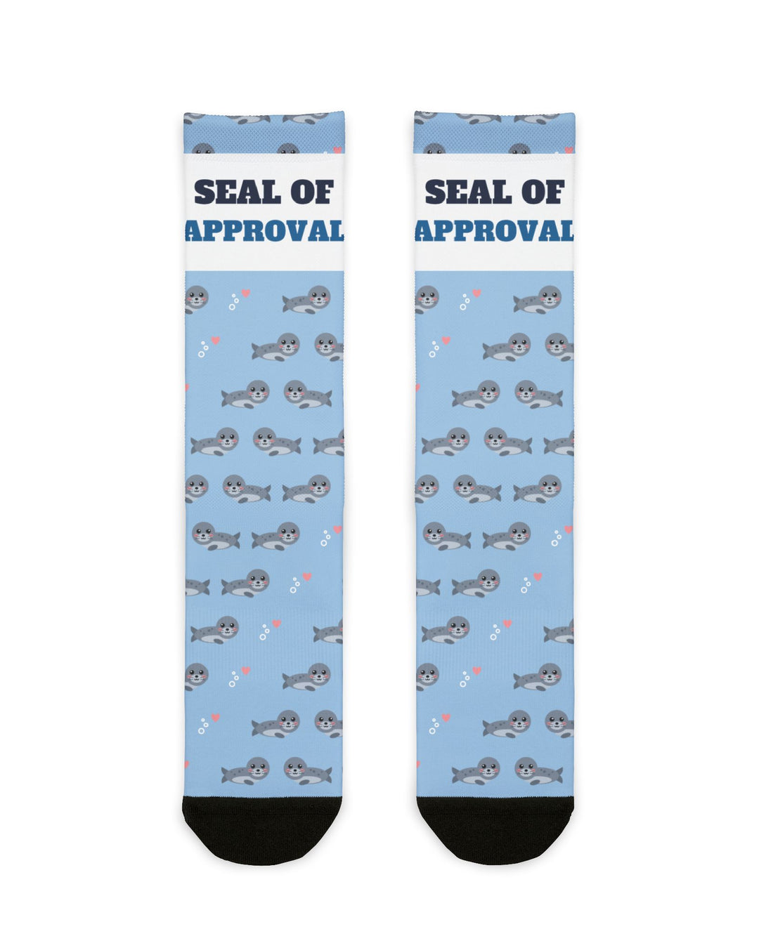 BlockBoundRI Seal of Approval Rhode Island socks, light blue with gray harbor seals and white slogan band, flat lay