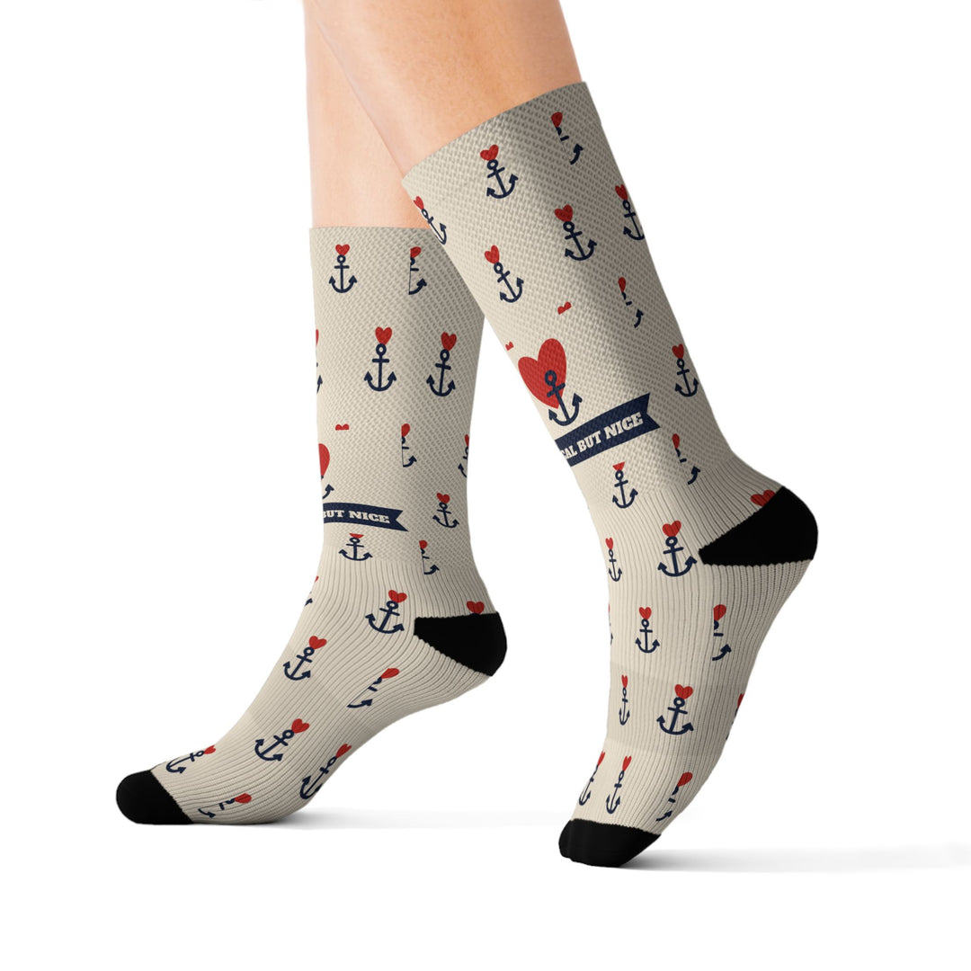 Size S Nautical But Nice retro sailor socks on a leg form, inner side showing the red heart anchor tattoo