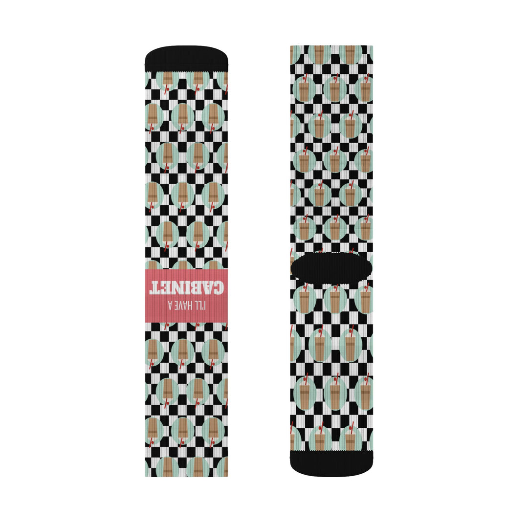 Front and back flat lay of a checkered I'll Have a Cabinet sock pair, black cuff and toe, coral band, Rhode Island socks