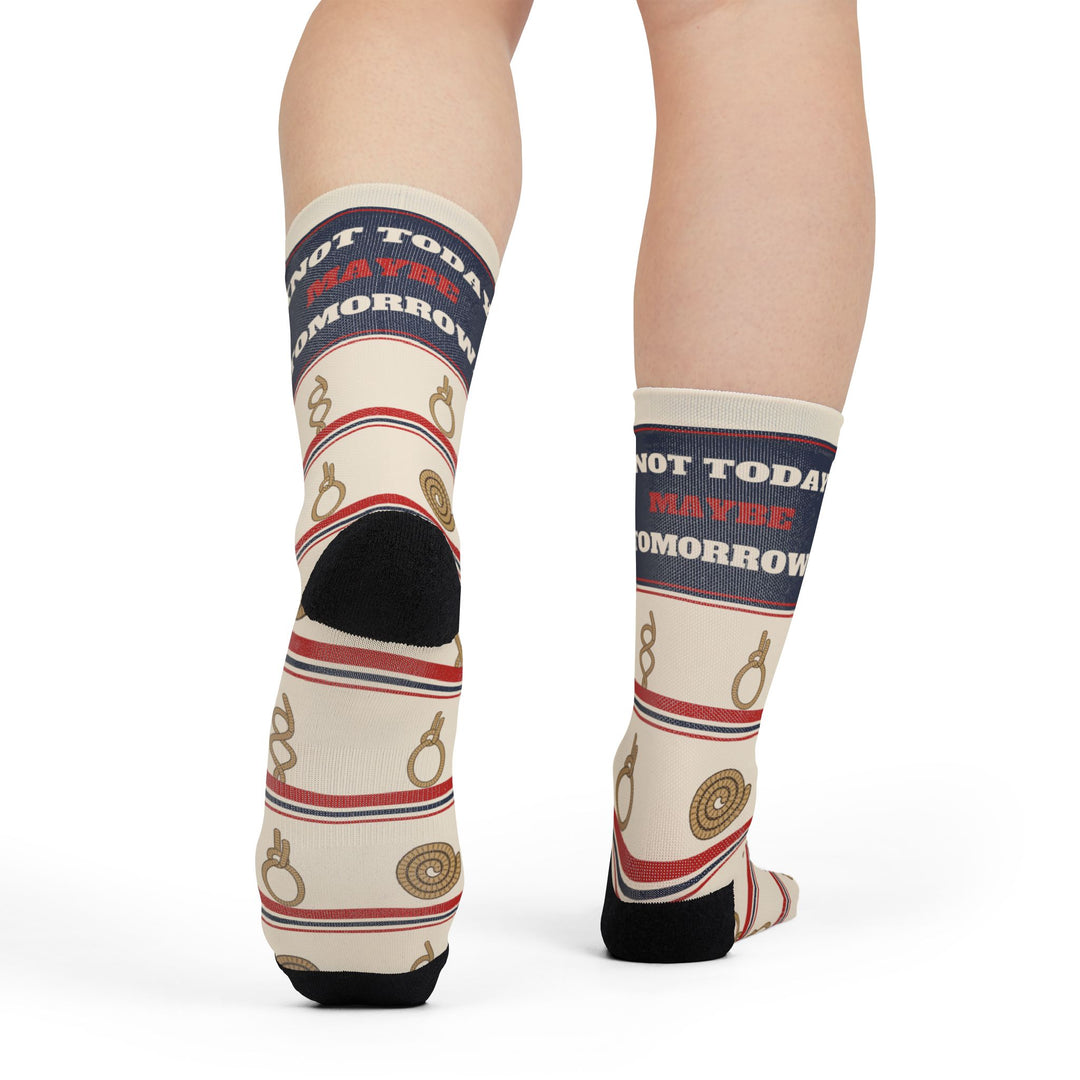 Rear view of legs in Knot Today rope knot socks showing black heels and red and navy striped bands