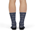 Model standing in navy Are We There Yet? nautical crew socks, back view showing the ferry pattern