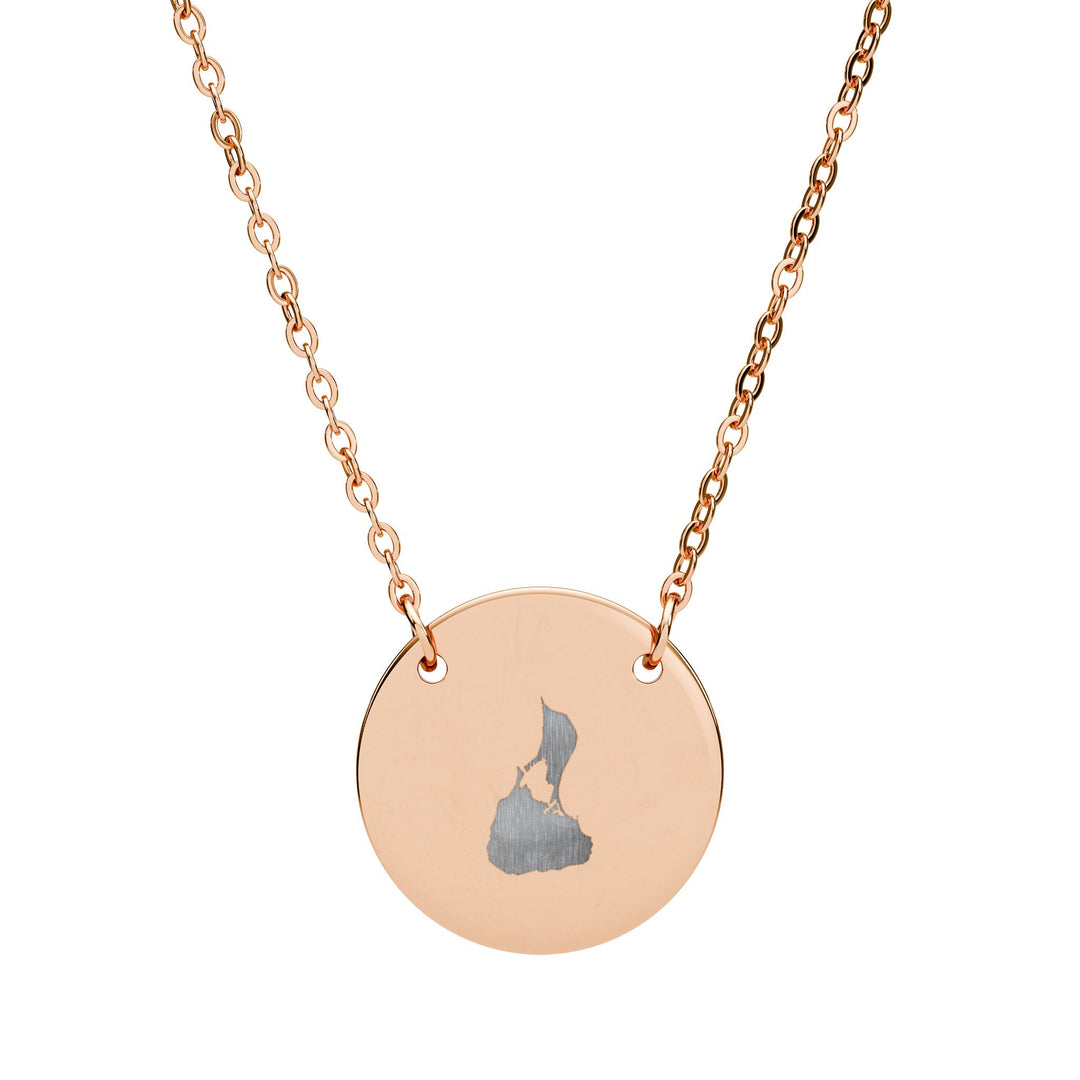 Round pendant necklace engraved with the outline of Block Island