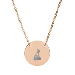 Round pendant necklace engraved with the outline of Block Island