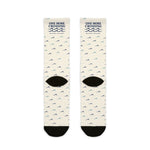 Back of off-white One More Crossing nautical crew socks flat lay showing wave pattern and black heels