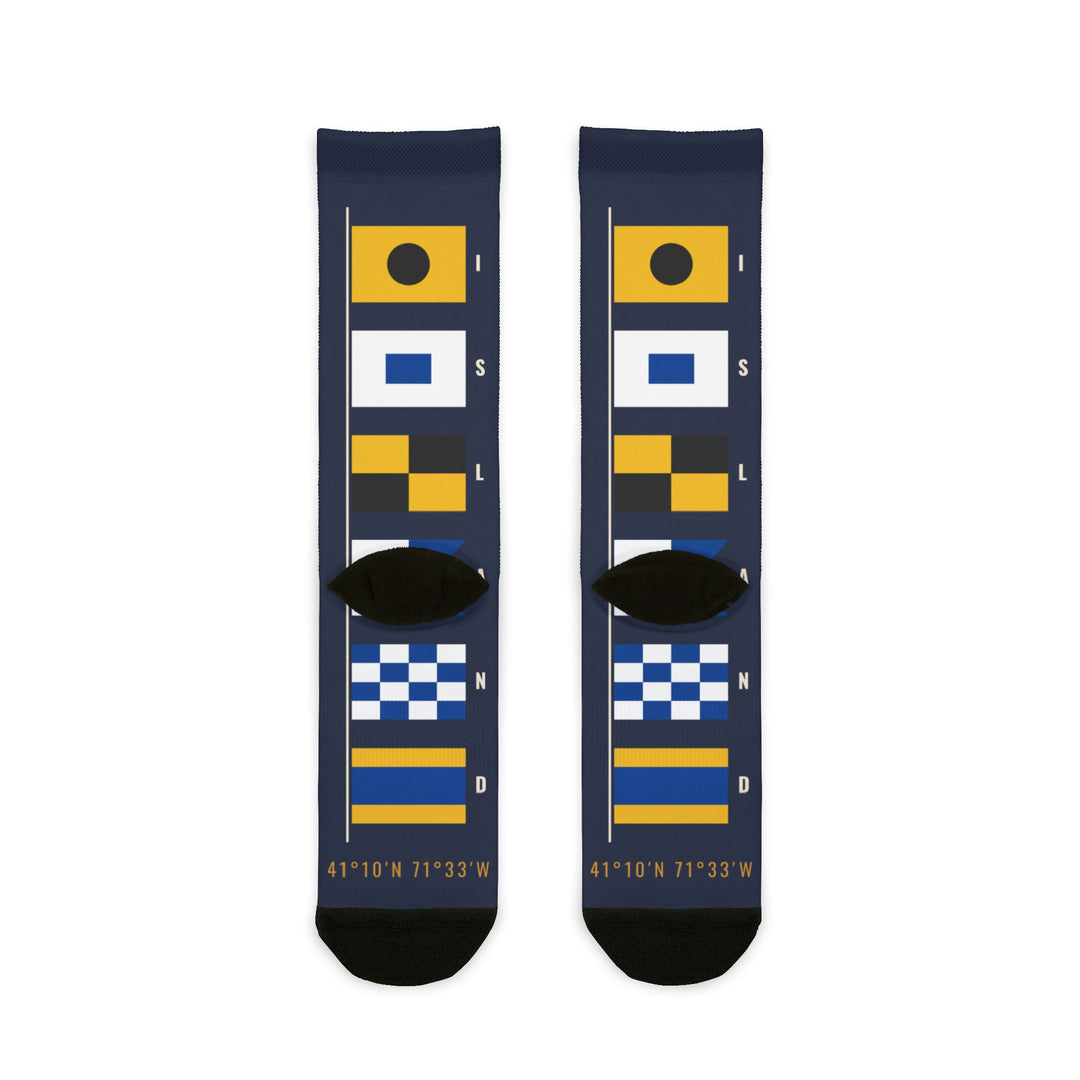 Back of the Block Island signal flag socks laid flat, navy with yellow, blue and checkered nautical flags