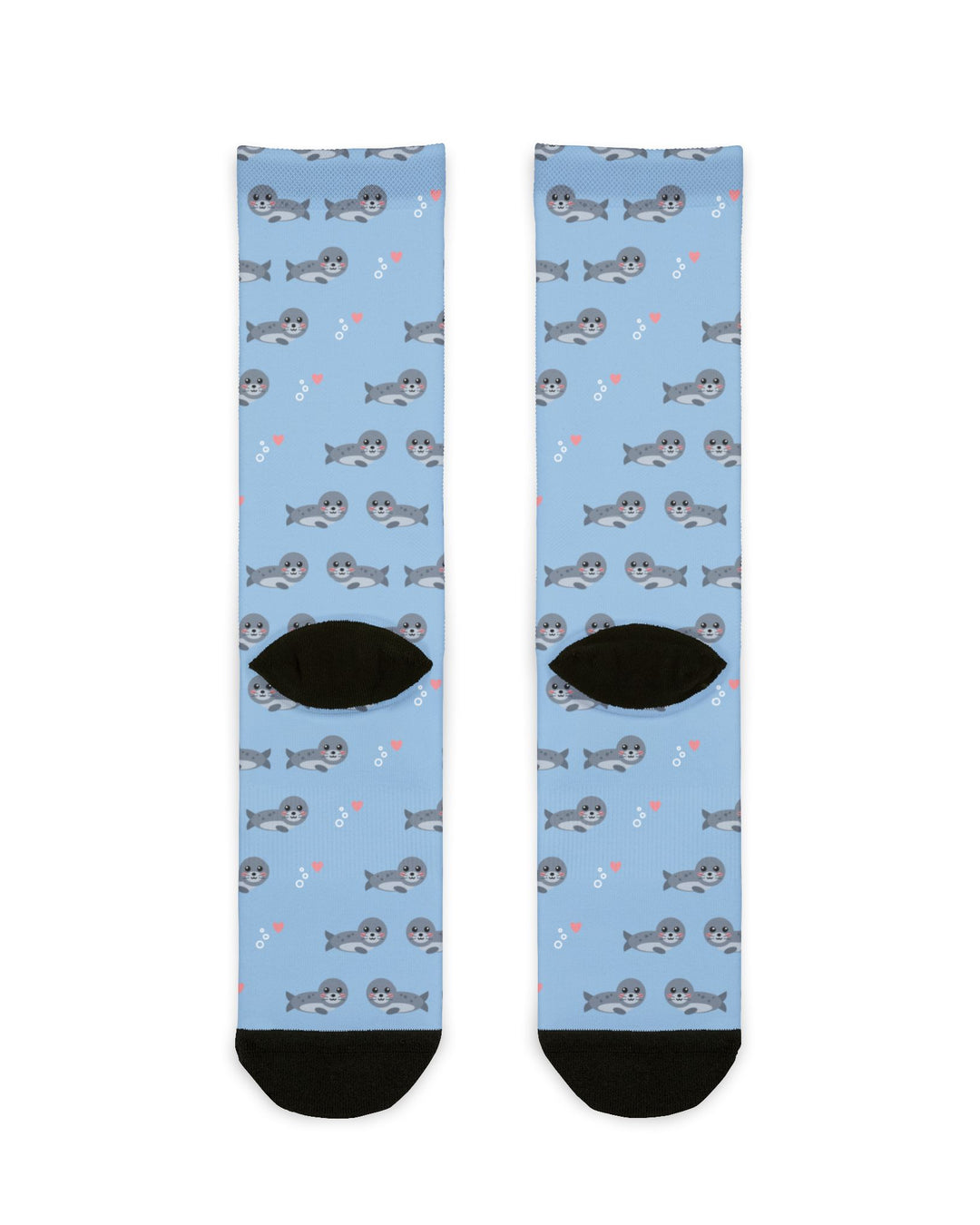 Back of the light blue Seal of Approval funny beach socks laid flat, showing harbor seal print and black heels
