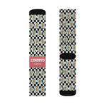 Pair of I'll Have a Cabinet funny beach socks flat, left sock showing the coral band, right sock showing its black heel
