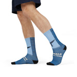 Side stride in Whale Hello There whale tail crew socks, light blue fading to deep ocean blue