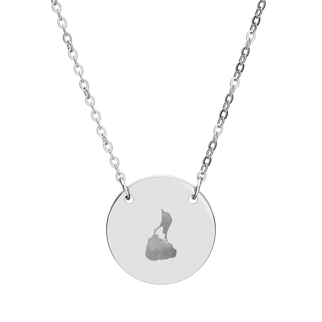 Round pendant necklace engraved with the outline of Block Island