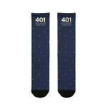 Flat lay of navy 401 State of Mind Rhode Island socks with cream 401 lettering and a scattered wave pattern