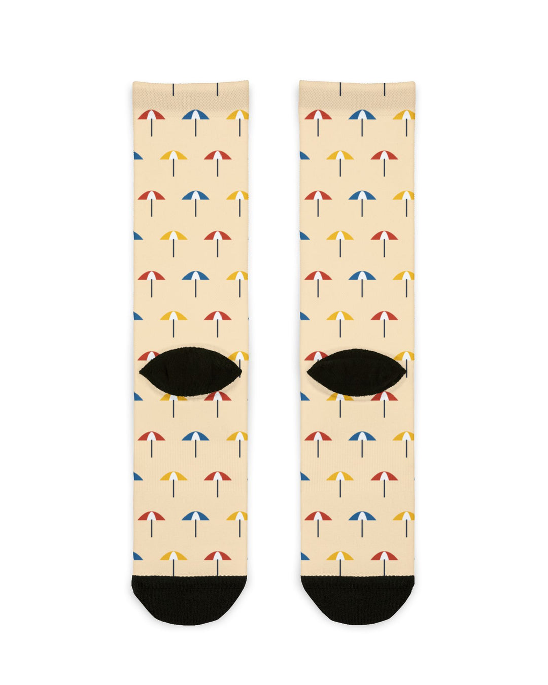 Back view of peach vacation socks with colorful beach umbrella print and black heels