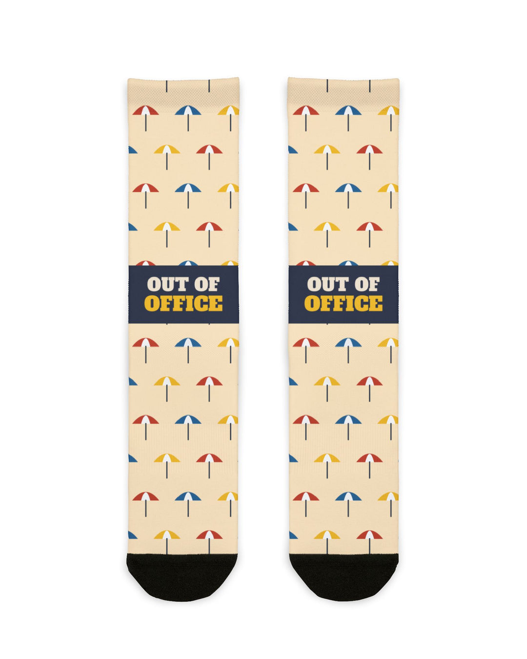 BlockBoundRI Out of Office socks flat lay, peach crew socks with beach umbrella print and navy slogan band