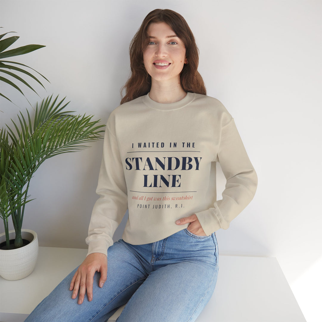 Woman seated beside a potted plant in the sand Standby Line Block Island sweatshirt