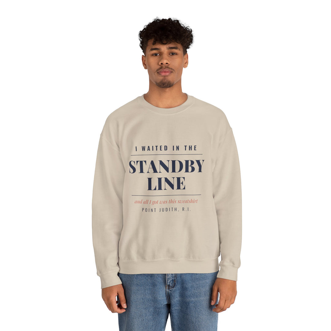 Man in jeans wearing the sand Standby Line Block Island sweatshirt with black lettering, front view