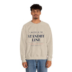 Man in jeans wearing the sand Standby Line Block Island sweatshirt with black lettering, front view