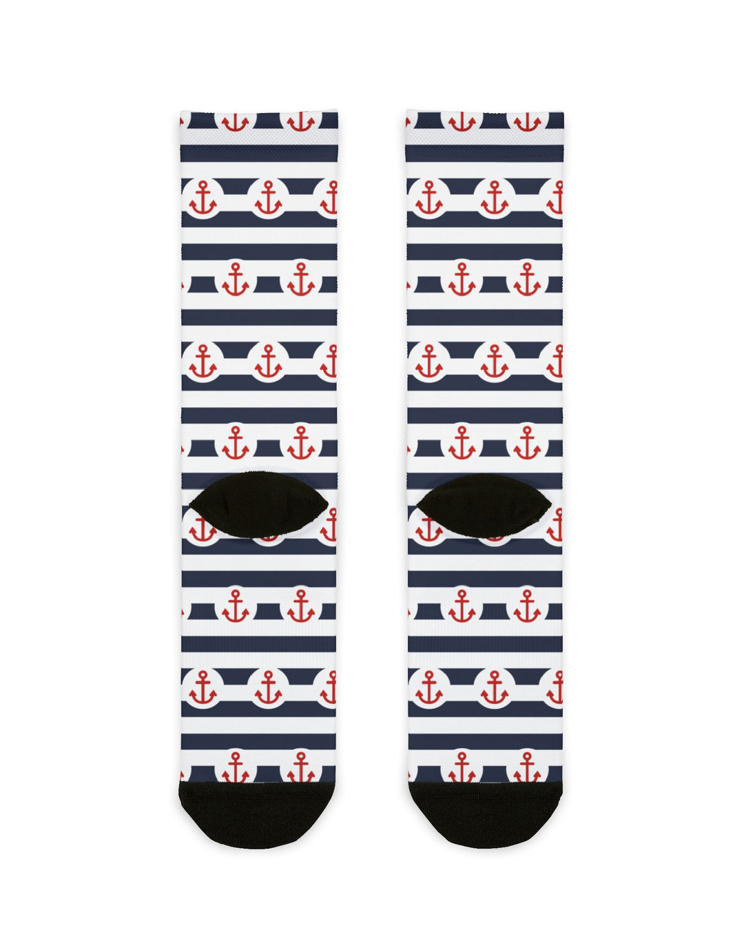 Back of the navy-striped anchor socks laid flat showing black heels and toes, red anchor nautical crew socks