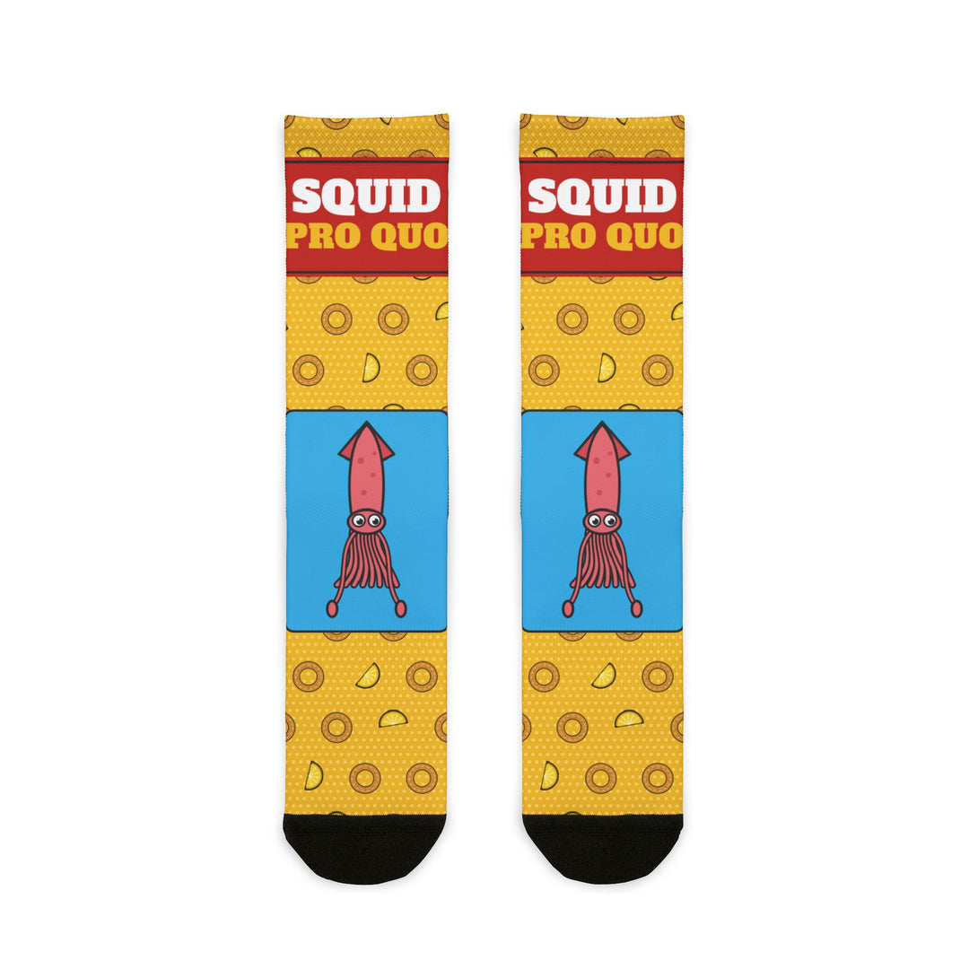 Squid Pro Quo funny Rhode Island socks in yellow with calamari rings, red slogan band and pink squid on blue, flat lay