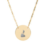 Round pendant necklace engraved with the outline of Block Island