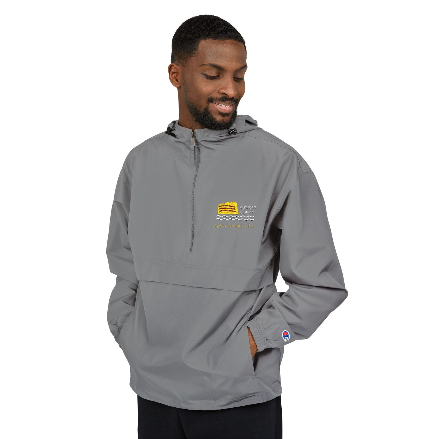 Champion packable anorak with embroidered Mohegan Bluffs cliff and surf mark on the left chest — view 6