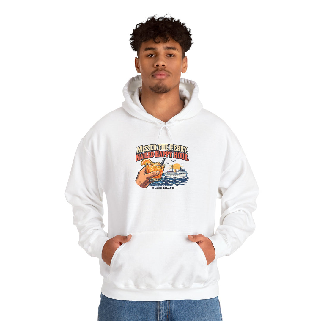 Man in jeans with hands in the pocket of the white Missed the Ferry. Nailed Happy Hour. Block Island sweatshirt