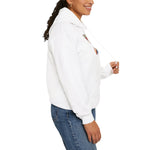 Side profile of a woman in jeans wearing the white Block Island hooded sweatshirt