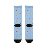 Back of light blue Beachcomber starfish socks showing black heels, Rhode Island socks flat lay