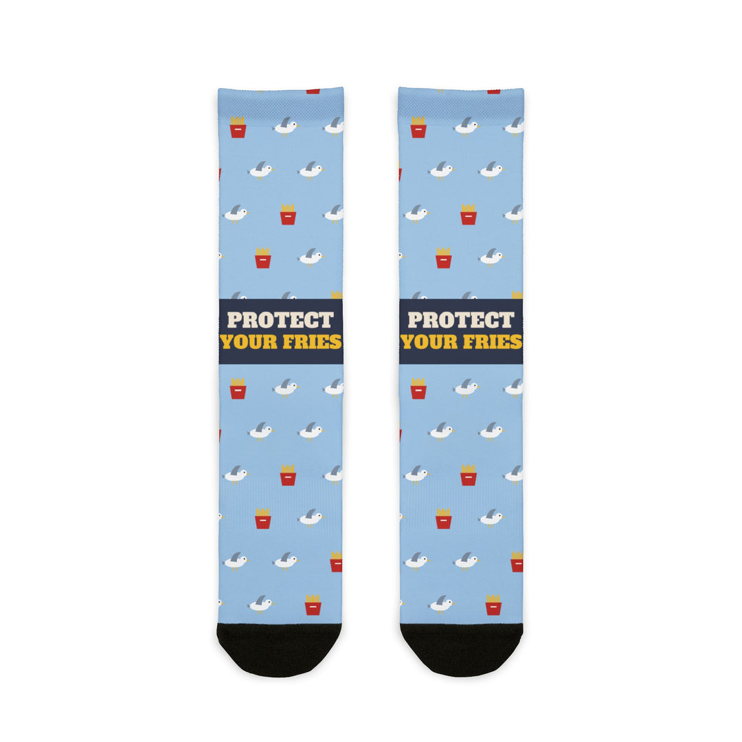 BlockBoundRI Protect Your Fries funny beach socks, light blue with seagulls, red fry cartons and black toes, front flat lay