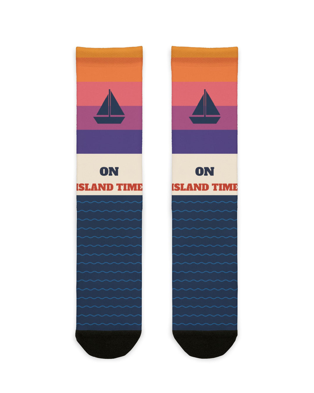 BlockBoundRI On Island Time Block Island socks with sunset stripes, navy sailboat and navy wave pattern, flat lay