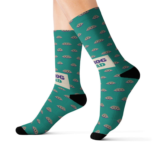 BlockBoundRI Quahog Squad socks in size L on leg forms, teal with a clam shell print and a cream Quahog Squad band