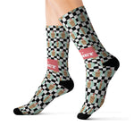 Size M I'll Have a Cabinet Rhode Island socks on leg forms, side view of the checkered pattern and black heels and toes