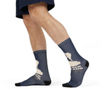 Model mid-stride in shorts wearing navy Block Island Outline map crew socks