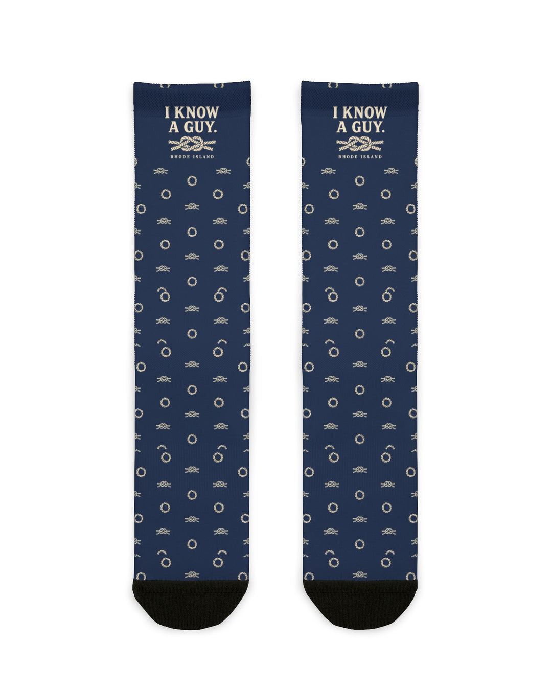 Flat lay of navy I Know a Guy. Rhode Island socks with a rope knot graphic and cream ring pattern