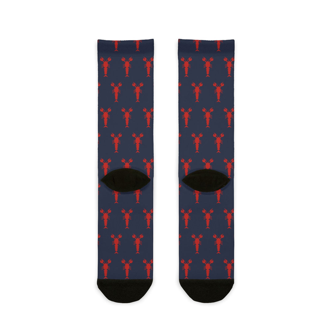 Back of the navy Property of Block Island lobster socks with red lobsters and black heels, Rhode Island socks