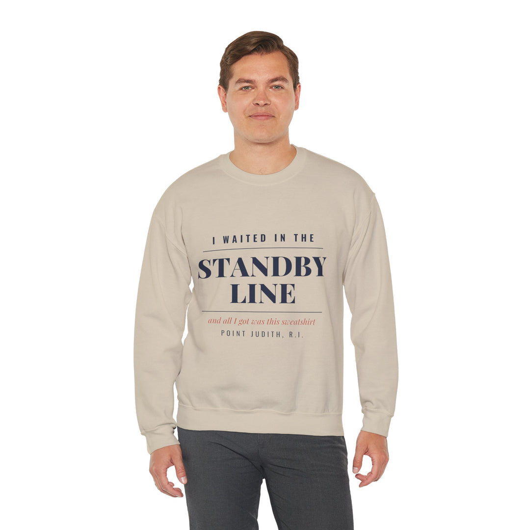 Man in gray pants wearing the sand I Waited in the Standby Line crewneck, a Block Island gift