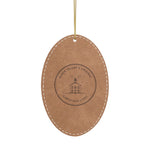 laser-engraved North Light leatherette ornament with engraved lighthouse detail