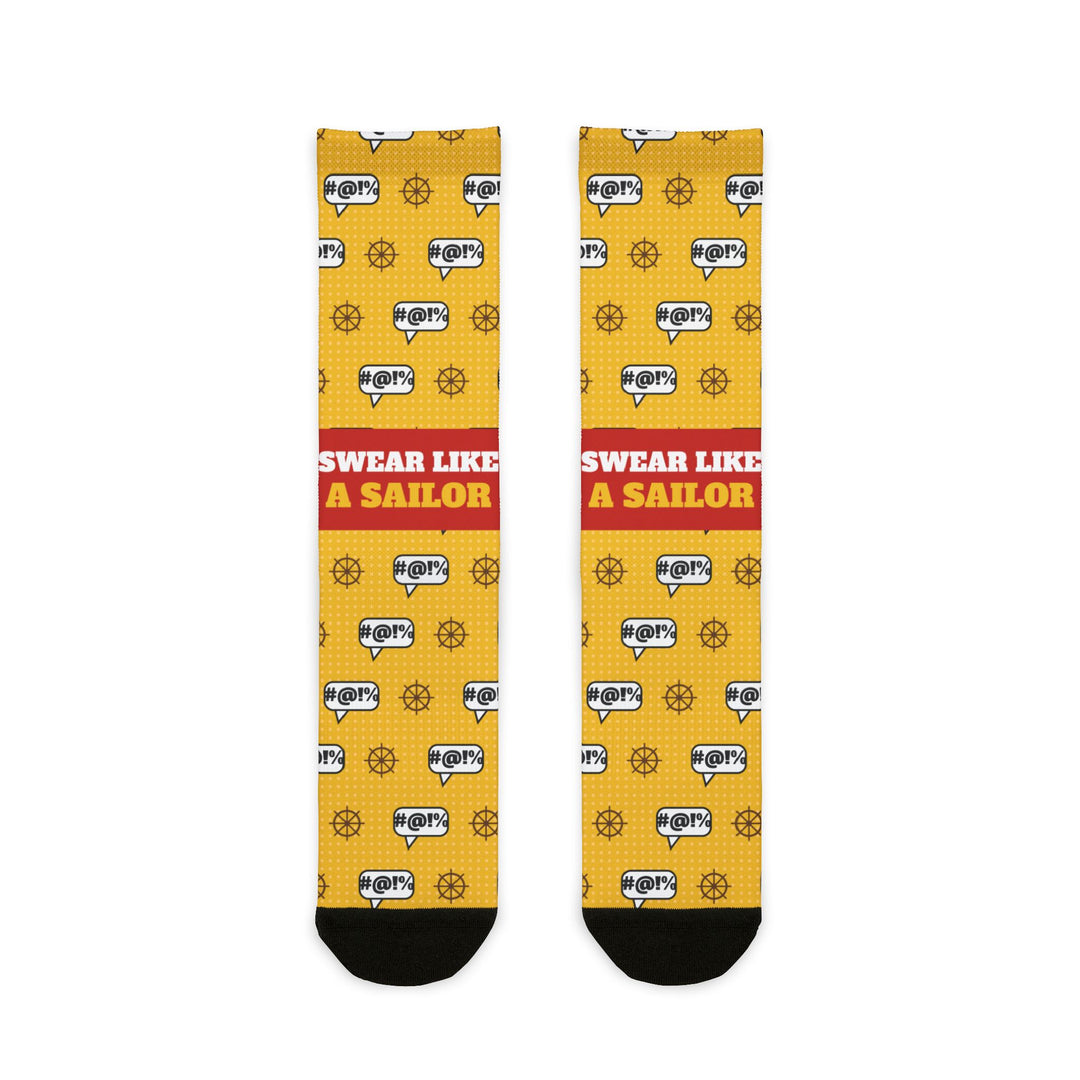 BlockBoundRI Swear Like a Sailor funny beach socks, yellow with grawlix #@!% speech bubbles and ship wheels, flat lay