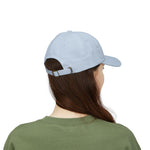 Woman in a green tee seen from behind in the Light Blue Block Island baseball cap with adjustable strap
