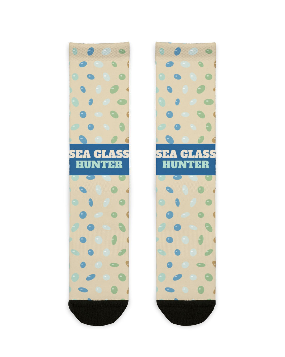BlockBoundRI Sea Glass Hunter socks flat lay, sand-colored crew socks with blue band and scattered sea glass print