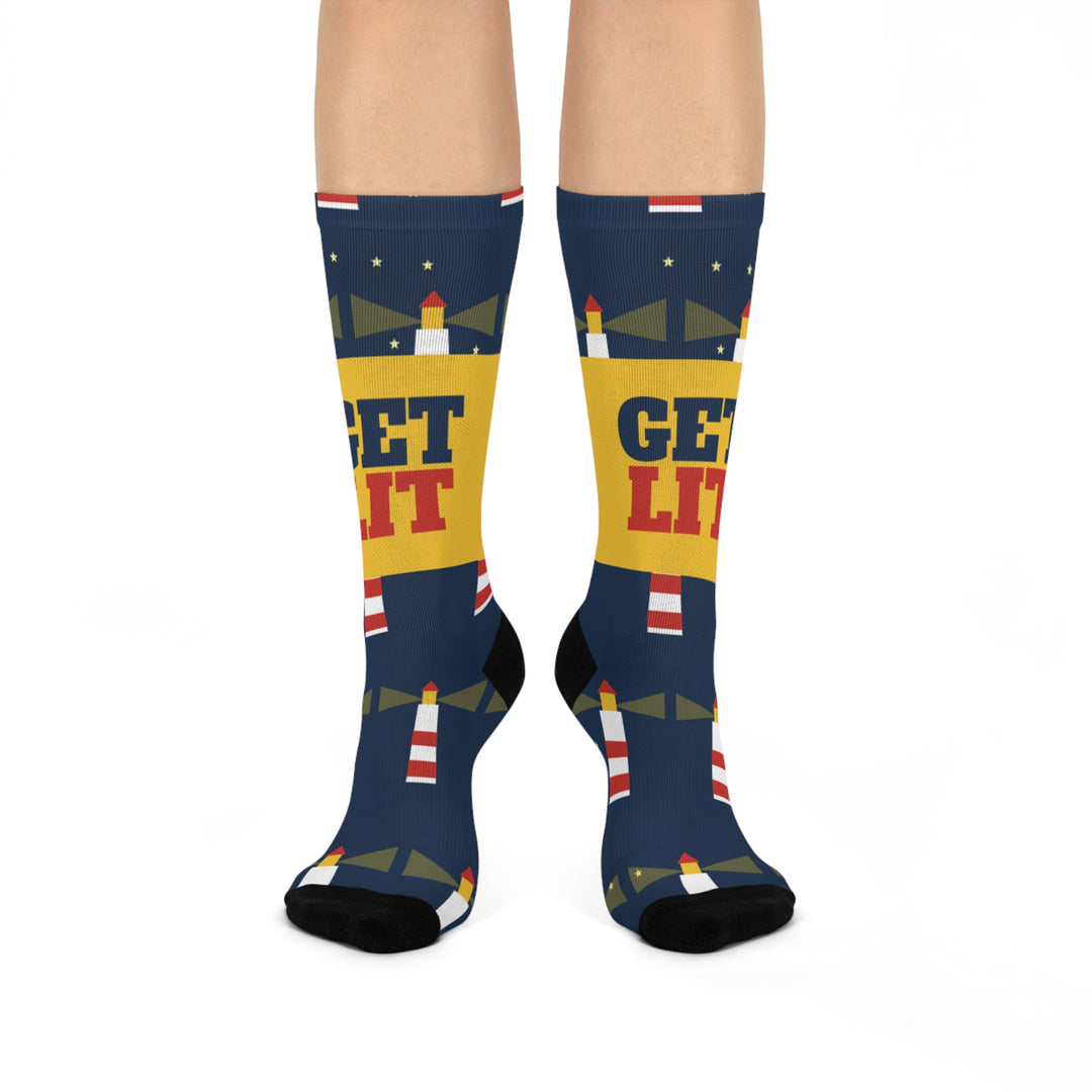 BlockBoundRI Get Lit lighthouse nautical crew socks on a standing model, navy with a yellow GET LIT band
