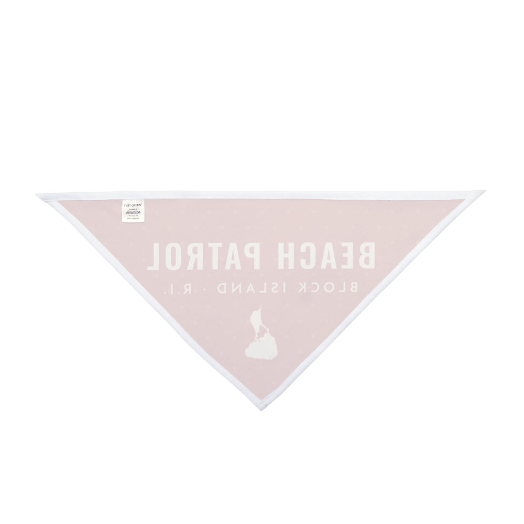 Reverse side of the red Beach Patrol bandana showing faded pale pink print, a Block Island pet gift