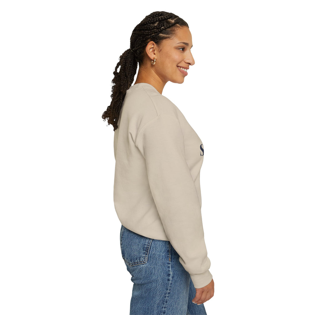 Side profile of a woman in the sand Standby Line Block Island ferry sweatshirt
