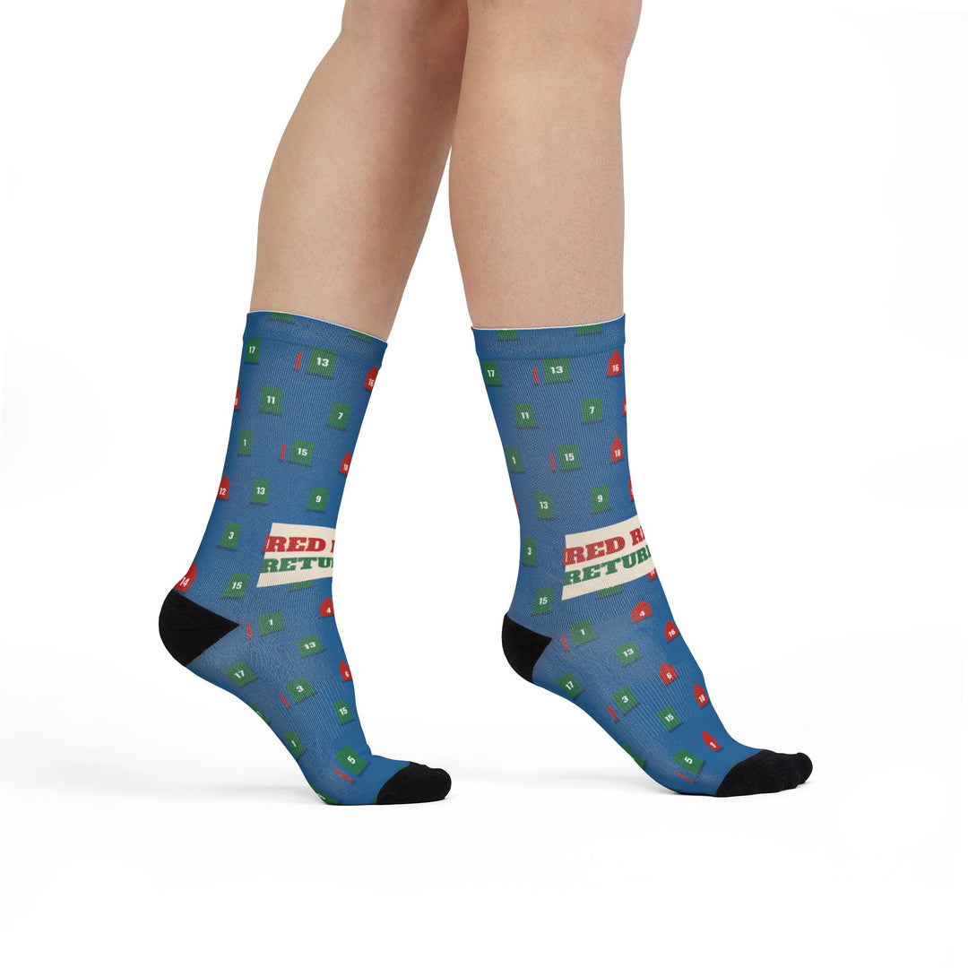 Model walking in blue Red Right Returning buoy socks with red and green markers, side view