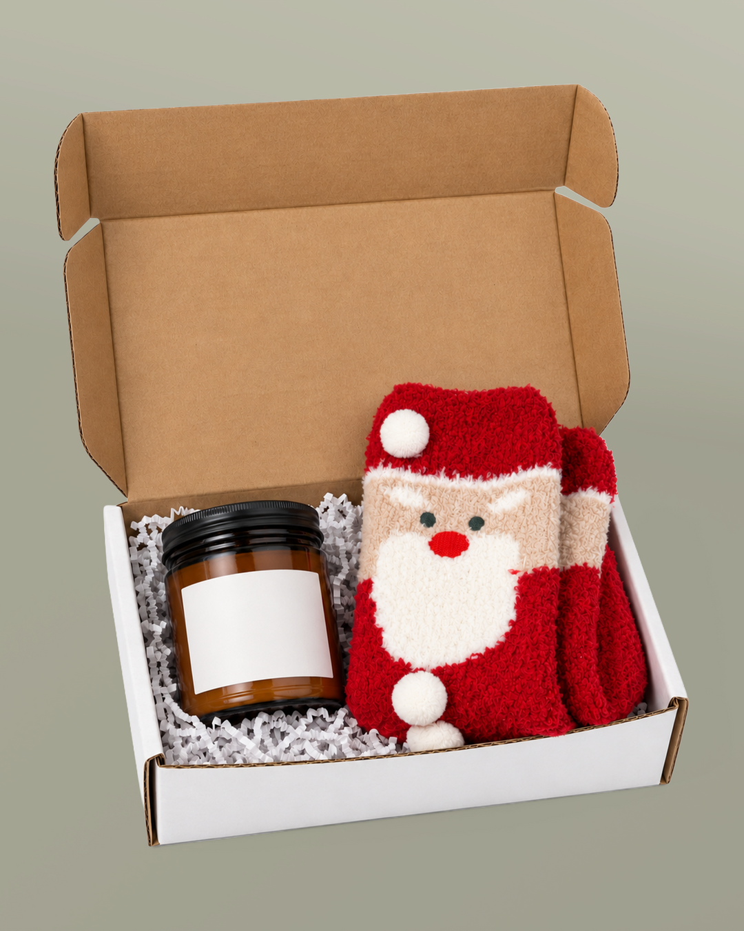 Block Island gift box with amber candle (sample blank label shown) and red fuzzy Santa socks
