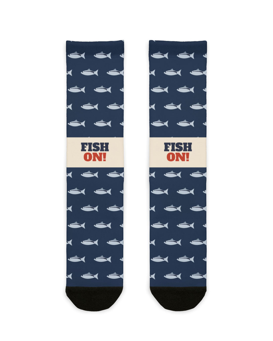 BlockBoundRI Fish On! striped bass socks flat lay, navy crew socks with white fish pattern and cream slogan band