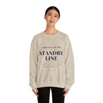 Woman in black pants modeling the sand I Waited in the Standby Line Rhode Island sweatshirt