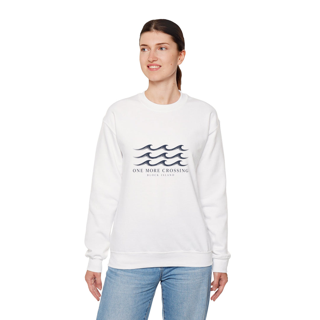 Smiling woman in jeans wearing the white One More Crossing Block Island sweatshirt, three-quarter view