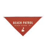 Large 27 x 13 red Beach Patrol dog bandana with Block Island R.I. text and white island silhouette, flat lay